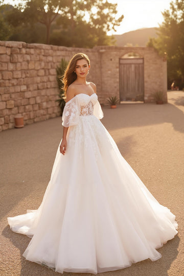 Robe de mariée longue corset en tulle ivoire à manches flottantes